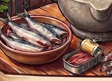 Sardinhas em uma tigela e uma lata de anchovas
